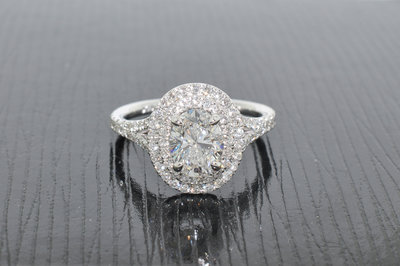 Oval shape halo diamond engagement ring